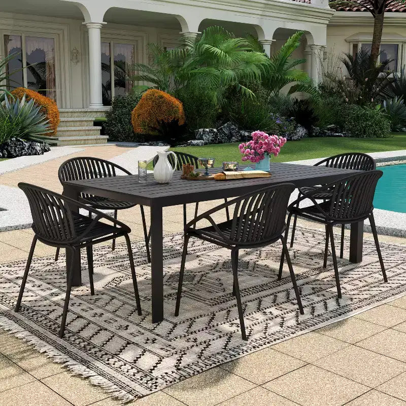 Conjunto de comedor moderno de 7 piezas para exterior Christopher Knight Home Paddy, de metal y polipropileno, con silla apilable