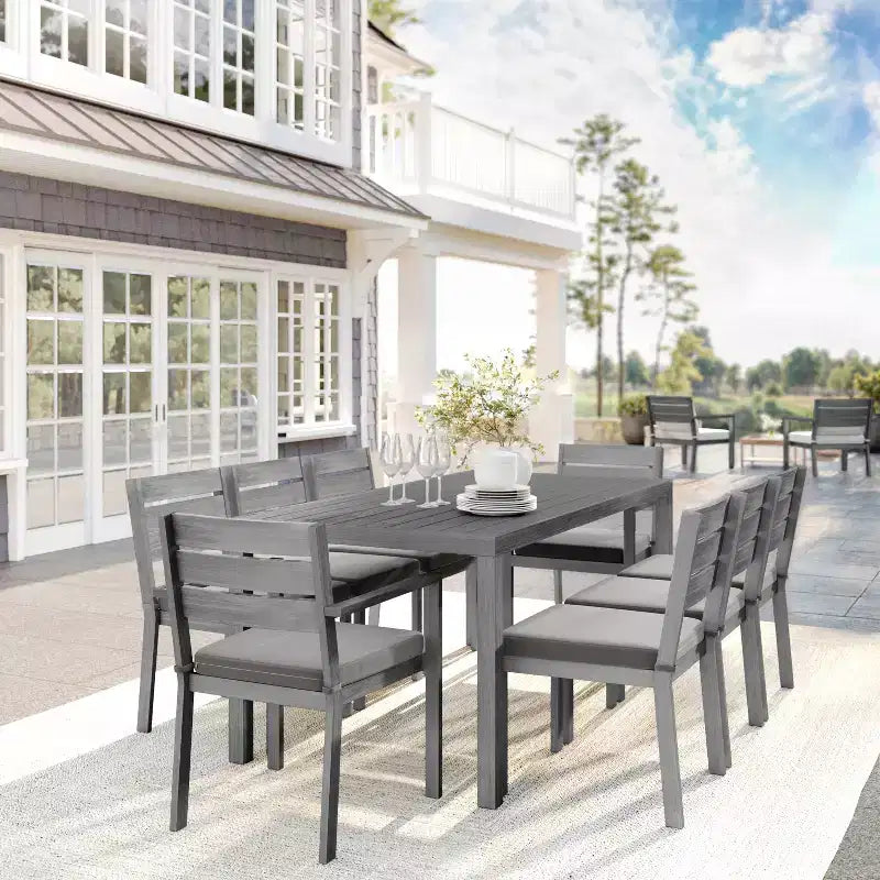 Set da patio per interni ed esterni Martha Stewart Bedford con tavolo da 71 e 8 sedie da pranzo, finitura in alluminio con venature del legno spazzolato e cuscini per seduta resistenti a tutte le condizioni atmosferiche