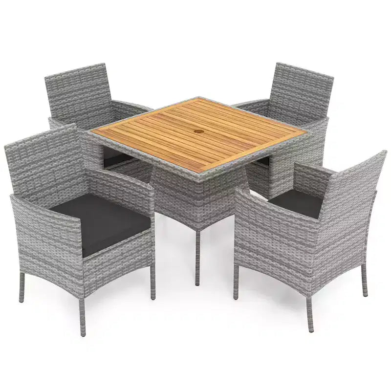 Set da pranzo da patio Costway da 5 pezzi in vimini PE, con cuscini e foro per ombrellone da 1,97