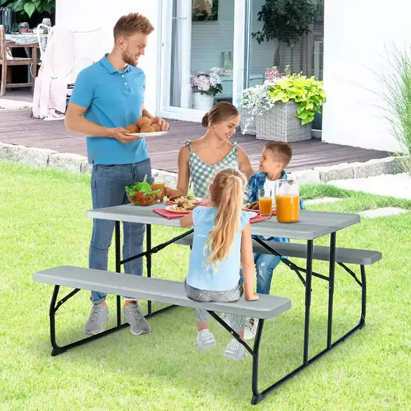 Conjunto plegable de mesa y bancos de picnic para interior y exterior con textura similar a la madera