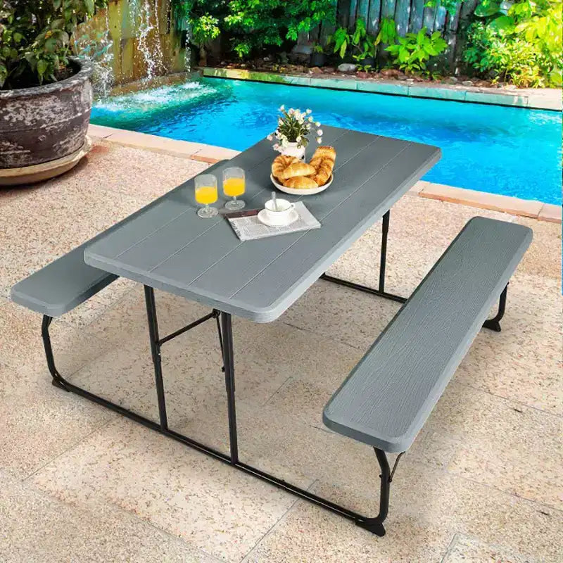 Conjunto plegable de mesa y bancos de picnic para interior y exterior con textura similar a la madera