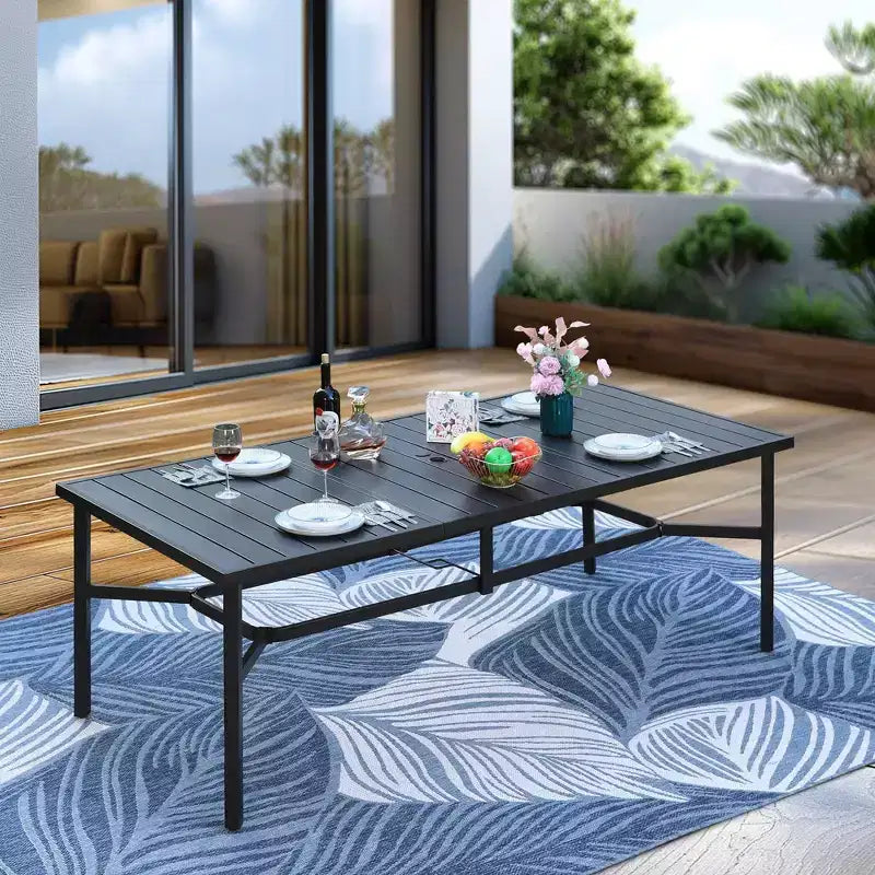 Captiva Designs conjunto de comedor exterior de 9 piezas con mesa rectangular de acero y sillas fijas de mimbre con cojines gruesos